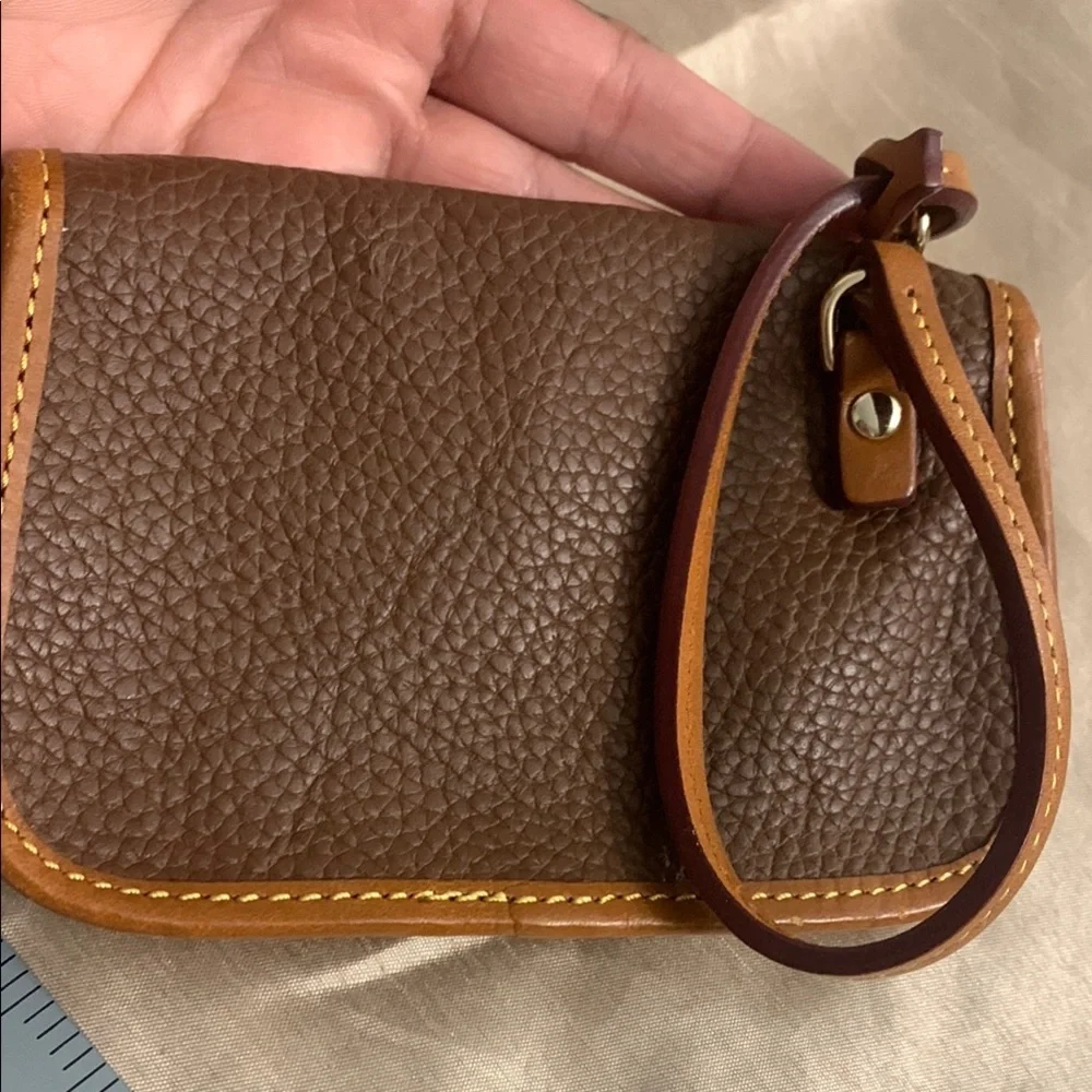 Dooney & Bourke Leather with Flap Closure and Wristlet NEVER USED LIKE NEW